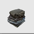 Stack of Casual Clothing Featuring Denim Jeans and Cotton T Shirts in Neutral Tones