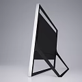 Modern Television With Black Frame Stand Showing Sunset Seaview Cloudy Sky And Sunlight Reflection