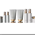 Elegant Luxury Cosmetics Collection With White Gold Bottles Tubes And Jars