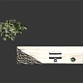Modern Marble Reception Desk With White Monitor Small Potted Plant And Large Green Plant