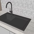 Black Undermount Kitchen Sink With Modern Faucet Light Colored Countertop And Textured Wall Tiles