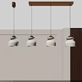 Minimalist Pendant Lights with White Shades and Wooden Bases Hanging in Modern Interior Setting