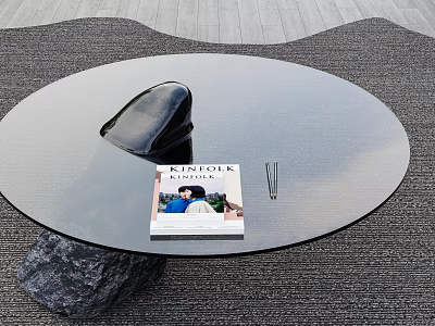 Modern Round Glass Coffee Table Featuring Black Stone Base Kinfolk Magazine And Pen 3d model