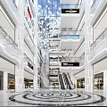 Modern Shopping Mall Atrium Interior With Glass Ceiling Hanging Lights And Escalators