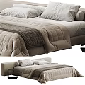 Modern Double Bed With Quilted Bedspread And Soft Pillows In Cozy Bedroom Setting