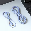 Two Light Blue USB C Cables For Phone Digital Charging Near Laptop