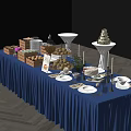 Elegant Dessert Table Setup With Assorted Cakes Cookies Flowers Candles And Blue Tablecloth