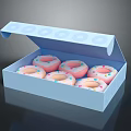 Open Blue Box Containing Six Pink Donuts With Colorful Sprinkles
