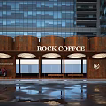 Commercial Street Scene Featuring Rock Coffee Shop With Rusted Metal Exterior And Large Glass Windows