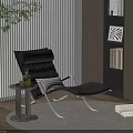 Modern Lounge Chair With Plaid Cushion Small Round Table Bookshelf And Green Plant