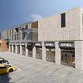 Modern Commercial Street with Beige Stone Facades Multiple Shop Fronts Glass Windows and Parking Area