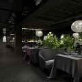 Modern Restaurant Interior With Red Black Decor Dining Tables Flowers And Pendant Lights