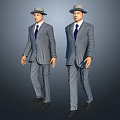 Two Men in Gray Suits with Blue Ties Wearing Hats Against Gray Background