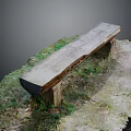 Rustic Outdoor Bench with Weathered Wood in Grass and Dirt Garden