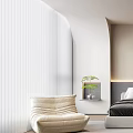 Modern Bedroom Interior With Bed Pillows Beige Chair Potted Plant And Framed