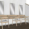 Wooden Dressing Table With Three Mirrors And Chairs In Sunlit Space