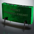 Green Military Weapon Featuring Front Toward Enemy Text And Metal Spikes
