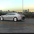 Urban Road Facilities Including Street Lamps Railings Yellow Lines And White Car At Sunset