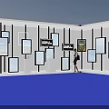 Modern Exhibition Space With Multiple Digital Screens And Person Walking On Blue Floor
