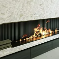 Modern Fireplace Design With Marble Background Black Grille Flames And Towels On Countertop Cabinets Below