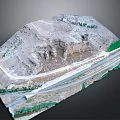 Aerial View Of Natural Mountainous Terrain With Winding Road Rock Formations And Green Vegetation