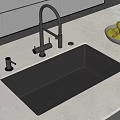 Modern Kitchen Faucet on Stainless Steel Sink with Soap Dispenser and Bowl of Green Apples