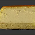 Creamy Cheesecake Slice With Caramelized Top And Crunchy Crust On Black Surface