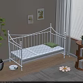 White Metal Bed Frame with Green Pillow and White Mattress on Wooden Floor