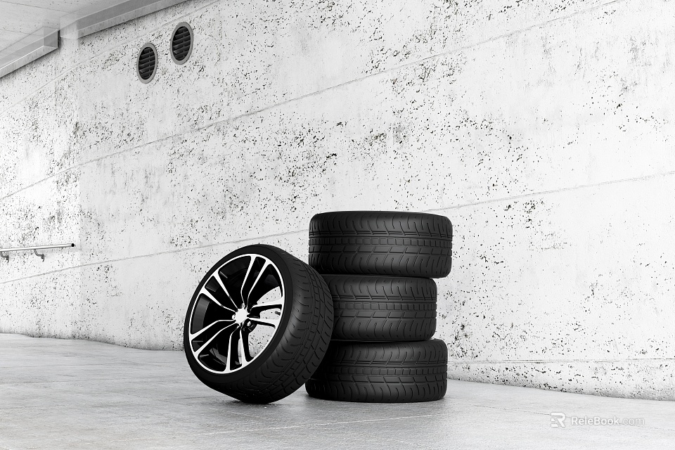 Standing Tire with Black Rim and Stacked Tires on Gray Floor Against Textured White Wall 3d model 