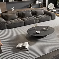 Modern Luxury Living Room With Grey Sofa Round Coffee Table Striped Rug Bookshelf And Green Plant