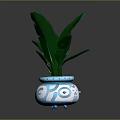 Green Leafy Plant In Blue And White Patterned Ceramic Pot With Fresh Leaves