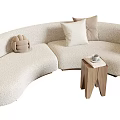 Curved Beige Plush Sectional Sofa With Pillows And Wooden Side Table