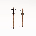 Two Brown Utility Poles With Lamps And Equipment On White Background