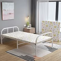 Cozy Room Interior With White Metal Folding Bed Patterned Mattress Nightstand And Table Lamp
