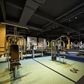 Spacious Fitness Gym Interior With Strength Training Machines Mirrors Floor Markings And Overhead Lighting