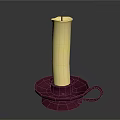 Decorative Yellow Wax Candle Placed On Red Candle Holder With Small Handle
