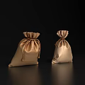 Elegant Decorative Ornament Set With Two Golden Satin Drawstring Pouches On Black Reflective Backdrop