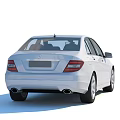 White Mercedes Benz Sedan With Modern Exterior Design And Front Grille Headlights