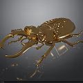 Golden Beetle Shaped Decorative Ornament With Intricate Details And Shiny Finish