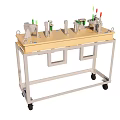 Industrial Equipment Workbench With Wheels Featuring Green Mechanical Components And Indicator Lights