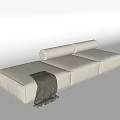 Modern Beige Sectional Sofa With Rolled Cushions And Cozy Throw Blanket 3d model