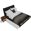 Modern Double Bed With Dark Headboard White Linens Decorative Pillow And Side Nightstand