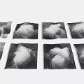 Garden Landscape Design Featuring Square Black and White Textured Prints of Natural Mountain Cloud Forms