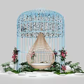 Decorative Blue Birdcage Structure With Beige Hanging Chair Flowers And Green Plants