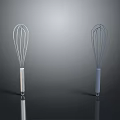 Two Household Kitchen Whisks With Silver And Blue Metal Handles For Daily Cooking Use