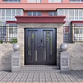 Black Double Door Entrance Gate With Stone Pillars Spherical Decorations Brick Wall And Red Building