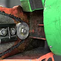 Vintage Red Chainsaw Body With Green Component And Black Cutting Chain