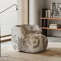 Stylish Patterned Accent Chair In Modern Living Interior With Floor Lamp And Bookshelf
