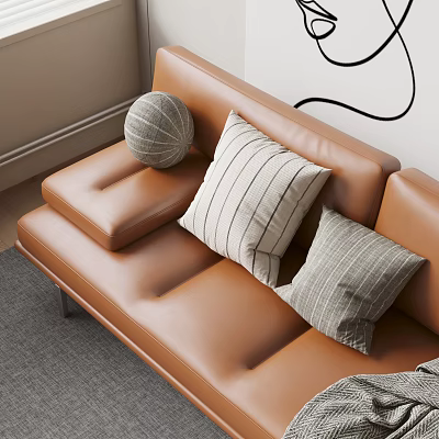 Stylish Throw Pillows On Brown Leather Sofa Featuring Striped And Round Designs 3d model
