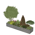 Gray Flower Bed Planter With Green Tree Red Conical Shrub And Low Growing Flowers